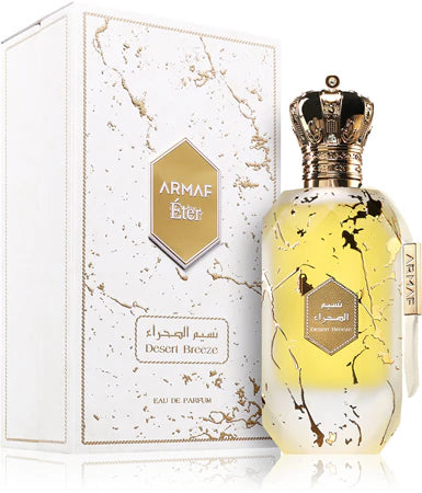 Perfume Eter Desert Breeze de Armaf, fragancia árabe unisex cítrica y amaderada con notas de limón italiano, jazmín, madera de oud, sándalo y almizcle.
