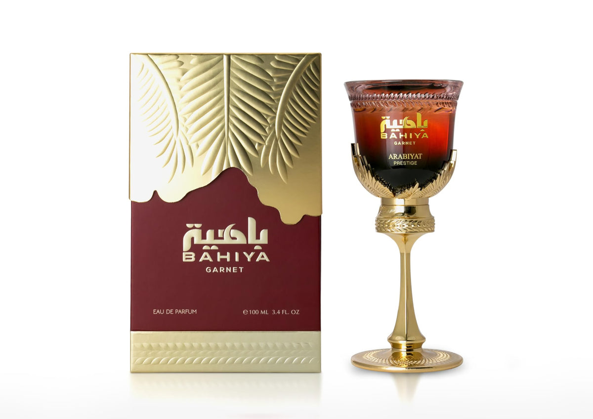 Perfume Bahiya Garnet de Arabiyat Prestige para mujer con notas de cereza, mango, pera, higo, jazmín, ámbar y vainilla.