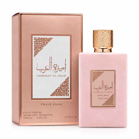 Perfume Ameerat Al Arab Prive Rose de Asdaaf 100 ml, frasco rosa con tapón dorado y caja original en tonos rosa y oro sobre fondo blanco.