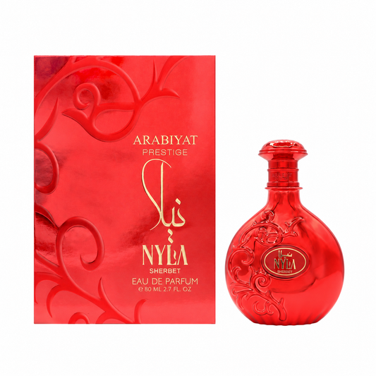 Perfume Nyla Sherbet de Arabiyat Prestige de 80 ml con frasco rojo de relieves florales y caja original roja sobre fondo blanco.