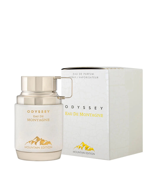 Perfume Odyssey Eau de Montagne de Armaf con notas de almendra, vainilla, cacao, sándalo y almizcle