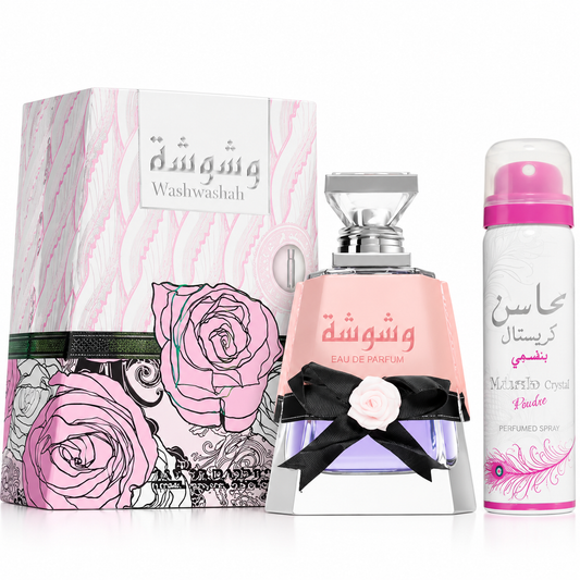 Set de perfume Washwashah de Lattafa con frasco rosa decorado con lazo negro, caja floral y spray perfumado Musk Crystal.